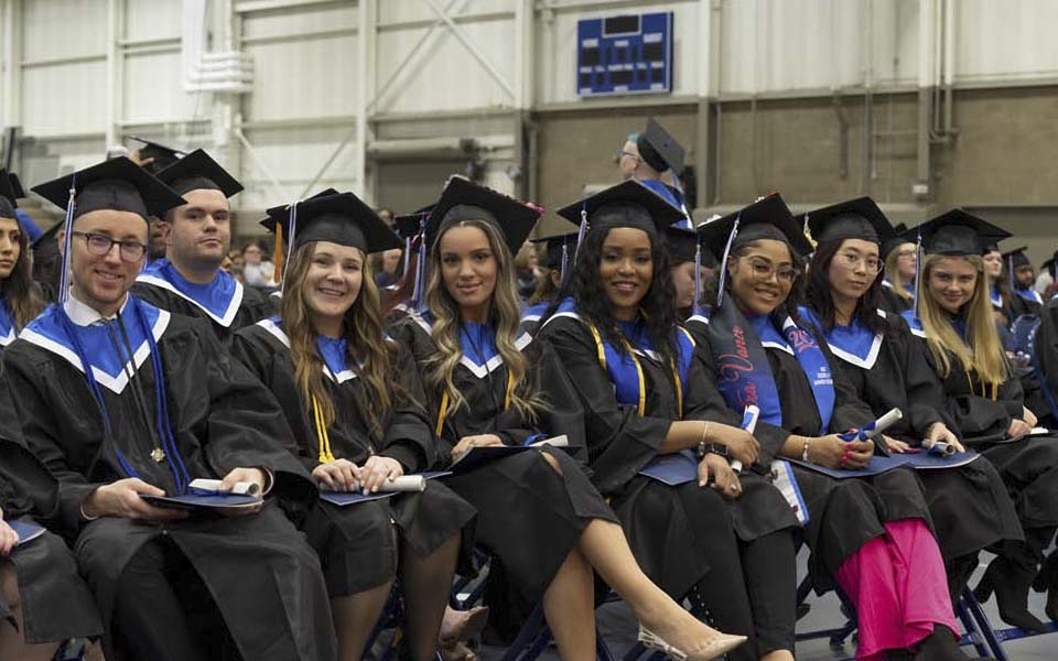 Graduates eagerly await the 107th commencement ceremony